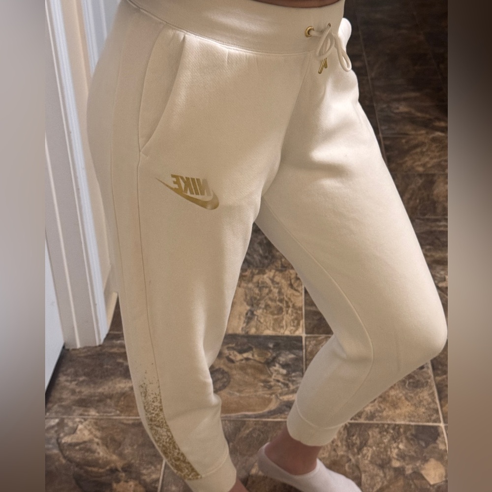 Nike White Sweatpants with Gold Logo